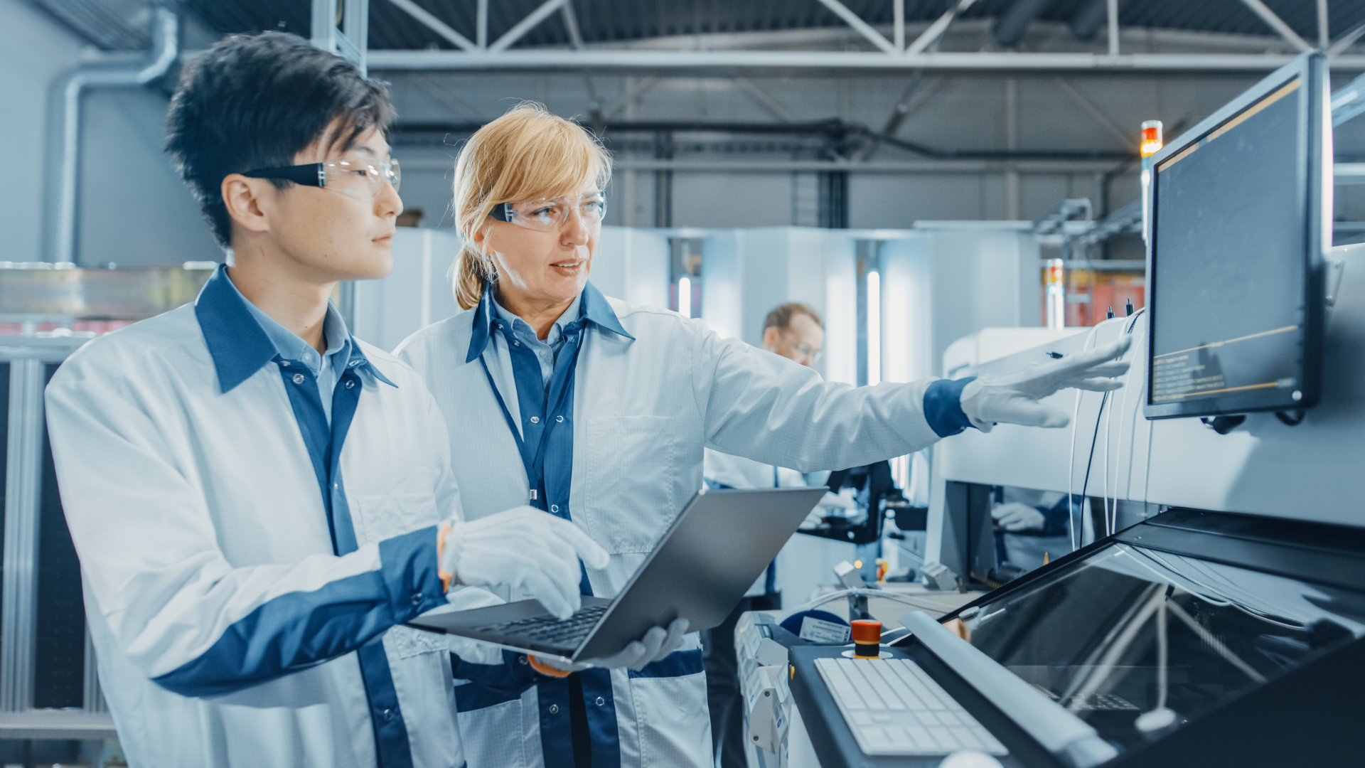 Engineers research on laptops